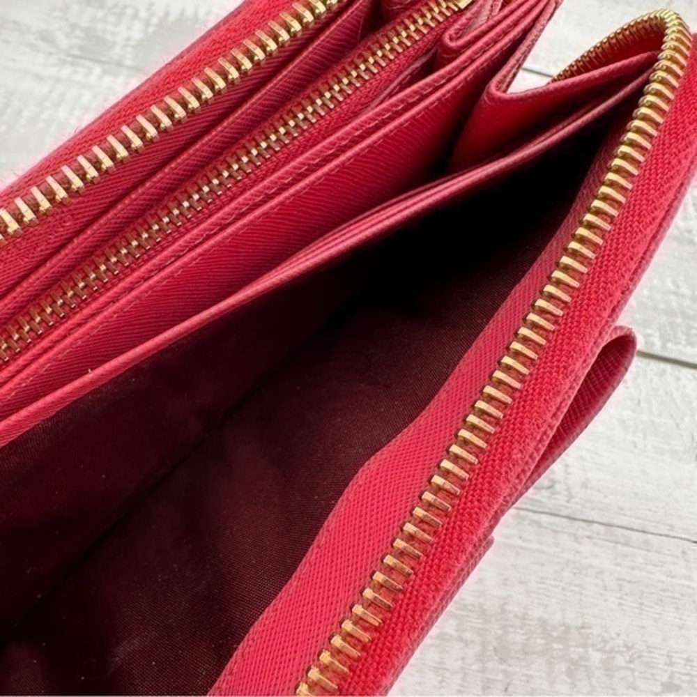 AUTHENTIC Prada Fiocco Bow Zip Around Wallet. Color: Peoria. - Picture 8 of 16